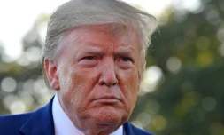 Donald Trump répond à la presse sur la pelouse de la Maison Blanche, le 11 octobre 2019 à Washington