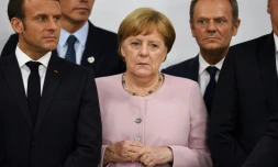 Le président français Emmanuel Macron, la chanceliÚre allemande Angela Merkel et le président du conseil Donald Tusk lors du sommet du G20 à Osaka le 29 juin 2019