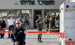 Des soldats et policiers israéliens sur les lieux d'une attaque meurtriÚre prÚs de la colonie d'Eli, dans le nord de la Cisjordanie occupée, le 20 juin 2023