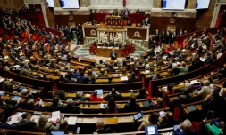 Le ministre de l'Intérieur Gérald Darmanin à l'Assemblée nationale à Paris le 11 décembre 2023, jour où une motion a rejeté son projet de loi immigration