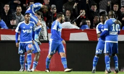 Les joueurs marseillais fêtent le but inscrit par Rémy Cabella contre Rennes au Roazhon Park, le 3 décembre 2015