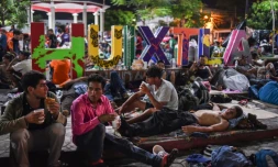 Des Honduriens en marche vers les Etats-Unis se reposent dans la ville de Huitxla, dans le sud du Mexique, le 22 octobre 2018