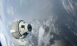 Illustration de la capsule Starliner en orbite autour de la Terre, fournie par Boeing en 2015