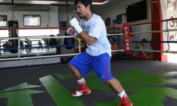 Le boxeur philippin Manny Pacquiao, portant des shorts et chaussures au logo Nike, pendant un entraßnement à General Santos, sur l'ßle des Mindanao aux Philippines, le 15 février 2016