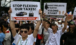 Des manifestants contre un scandale de corruption autour d'infrastructures "fantômes" aux Philipppines, à Manille le 21 septembre 2025
