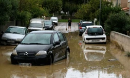 Une rue inondée à Villegailhenc dans l'Aude le 15 octobre 2018
