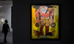 Un tableau du peintre américain Jean-Michel Basquiat "Sugar Ray Robinson" exposé par la maison de ventes aux enchères Christie à Hong Kong, le 23 novembre 2016