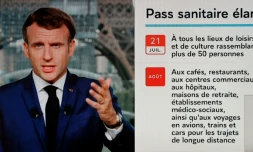 Le président français Emmanuel Macron s'exprime lors d'un discours télévisé à Paris, le 12 juillet 2021.