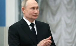 Photo diffusée par l'agence russe Spoutnik du président Vladimir Poutine s'exprimant lors d'une cérémonie au Kremlin le 26 mars 2024