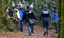Des gendarmes et des membres de la police scientifique  participent à des recherches dans l'enquête sur la disparition de la famille Troadec, le 3 mars 2017 à Dirinon 