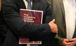 Un participant à la réunion sur la réforme des retraites à Paris le 18 juillet 2019