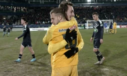 Des joueurs de l'équipe du FC Pau célÚbrent leur victoire face aux Girondins de Bordeaux au Stade du Hameau, à Pau, le 16 janvier 2020