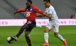 Le milieu canadien de Lille, Jonathan David (g), auteur d'un doublé lors du match de Ligue 1 à domicile contre Marseille, le 3 mars 2021