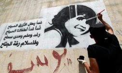 Un artiste tente d'alerter sur la mort et l'exploitation des enfants dans le conflit au Yémen, le 11 août 2016 à Sanaa