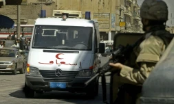 Un double attentat suicide a fait lundi au moins 26 morts, en majorité des travailleurs journaliers, dans le centre de Bagdad