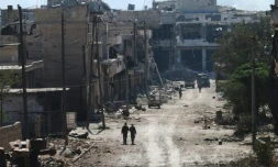 Des combattants pro-régime dans les faubourgs d'Alep, le 9 septembre 2016