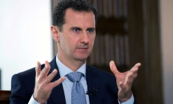 Photo fournie le 31 mars 2016 par l'agence de presse syrienne Sana du président Bachar al-Assad lors d'un entretien à l'agence de presse officielle russe Ria-Novosti à Damas