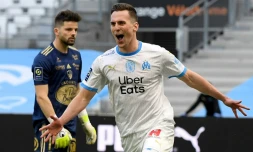 La joie de l'attaquant polonais de Marseille, Arkadiusz Milik, après avoir ouvert le score à domicile contre Brest, lors de leur match de Ligue 1, le 13 mars 2021 au Stade Vélodrome