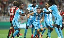 Les joueurs de l'OM regroupés autour de Florian Thauvin, buteur contre l'OGC Nice à l'Allianz Riviera, le 11 septembre 2016