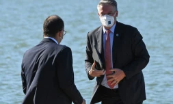 Le secrétaire général de l'OCDE Mathias Cormann (d) arrive au sommet du G20 Finances à Venise le 9 juillet 2021