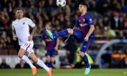 L'attaquant uruguayen de Barcelone Luis Suarez (D) buteur lors de la réception de l'AS Rome en Ligue des champions le 4 avril 2018