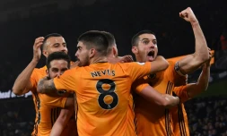 Les joueurs des Wolverhampton Wanderers fêtent le 3e but de leur équipe contre Manchester City, le 27 décembre 2019 au stade Molineux à Wolverhampton.