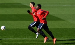 Angel Di Maria et Serge Aurier à l'entraînement le 5 avril 2016 à Saint-Germain-en-Laye