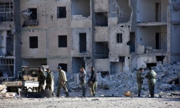 Des soldats du régime syrien dans le quartier Masaken Hanano, le 27 novembre 2016 à Alep