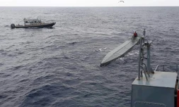 Photo transmise par les services de la Marine colombienne le 21 janvier 2024 montrant la capture, avec l'appui des Forces armées équatoriennes, d'un semi-submersible près du port colombien de Buenaventura
joint operation with the Ecuadorean Armed Forces, on arrival at Buenaventura, Valle del Cauca department Colombia. Packages containing 795 kilograms of cocaine hydrochloride were seized from inside the semi-submersible.