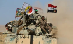 Des combattants des unités paramilitaires du Hachd al-Chaabi avancent vers Tal Afar, le 20 août 2017