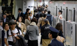 Des usagers du métro à la station Shibuya, le 1er mars 2018