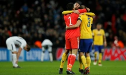 La joie des joueurs de la Juventus Gianluigi Buffon, Andrea Barzagli et Giorgio Chiellini, après la victoire contre Tottenham et la qualification en quarts de finale, le 7 mars 2018 à Wembley 
