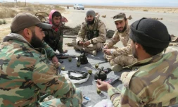 Soldats syriens le 29 mars 2016 près de Palmyre