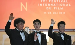 (g-d) Le réalisateur Bong Joon-Ho, les acteurs Choi Woo-shik et Lee Sun-kyun, avant la projection du film "Parasite", lors de la 72e édition du festival de Cannes, le 21 mai 2019