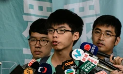Joshua Wong, Nathan Law et Alex Chow, figures de la "révolte des parapluies", le 15 août 2016 à Hong-Kong