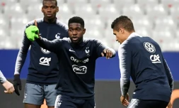 Le central Samuel Umtiti avec ses coéquipiers lors d'une séance d'entraînement des Bleus au Stade de France, le 24 mars 2019, à la veille d'affronter l'Islande