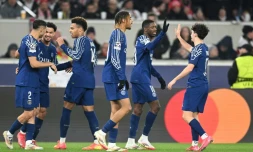 L'attaquant du Paris-SG Ousmane Dembélé (2e à droite) fête son 3e but avec ses coéquipiers lors du match contre Stuttgart en phase de ligue de la C1 le 29 janvier 2025 en Allemagne 