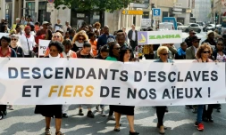 Plusieurs milliers de personnes manifestent à Paris à l'occasion du 20e anniversaire du 23 mai jour en mémoire des vcitmes de l'esclavage, le 23 mai 2018