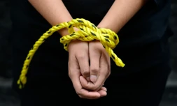 Des militants d'Amnesty International lors d'une manifestation contre la torture le 4 septembre 2014 à Mexico