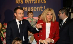 Emmanuel et Brigitte Macron, à Paris à la manufacture des Gobelins le 19 décembre 2018 pour célébrer le Noël des enfants du personnel de l'Elysée