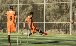 Photo de joueurs d'une équipe palestinienne de football rassemblant des personnes amputées, pour la plupart dans le cadre du conflit avec Israël, prise le 9 juillet 2018 à Deir al Balah, dans la bande de Gaza