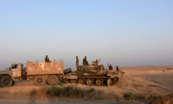 Des membres de l'armée syrienne, le 10 septembre 2017 près de Deir Ezzor en Syrie