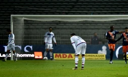 Les joueurs de l'OL dépassés par les Montpelliérains, ici après le 4e but à Gerland, le 27 novembre 2015