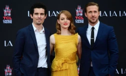 Le réalisateur Damien Chazelle (g) et les acteurs Emma Stone et Ryan Gosling à Hollywood, le 7 décembre 2016