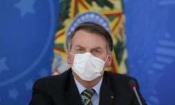 Le président brésilien Jair Bolsonaro tient une conférence de presse, le 18 mars 2020 au palais présidentiel à Brasilia