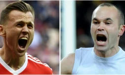 Photo combinée des mileux de terrain russe, Denis Cheryshev, (g) et espagnol, Andrés Iniesta, le 29 juin 2018     