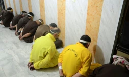 Des jihadistes menottés avant leur exécution, à Nasiriyah en Irak - photo diffusée par les autorités irakiennes le 29 juin 2018