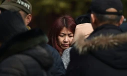 Des parents de passagers du vol MH370 de la Malaysia Airlines, disparu en vol, se retrouvent le 8 mars 2016 à Pékin pour le 2Úme anniversaire de cette catastrophe aérienne qui reste un mystÚre