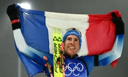 Le biathlète Quentin Fillon Maillet après sa victoire lors de la poursuite des Jeux olympiques de Pékin, le 13 février 2022