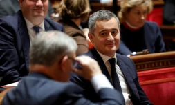 Le ministre de l'Intérieur Gérald Darmanin au Sénat à Paris après l'adoption du projet de loi immigration par les sénateurs, le 14 novembre 2023